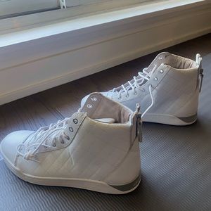 Diesel hi top sneakers for sale in pure white. Never worn and in great condition